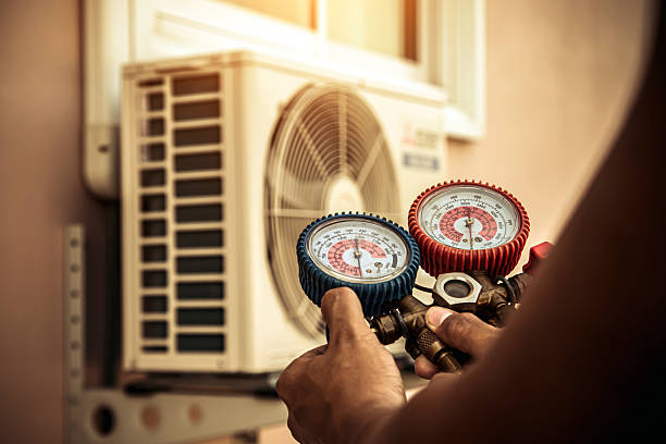 Professional Ductwork Repair technician working in Plainview, NY